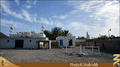 The minaret of the Shajra Mosque and its distance from these wells are known in this picture